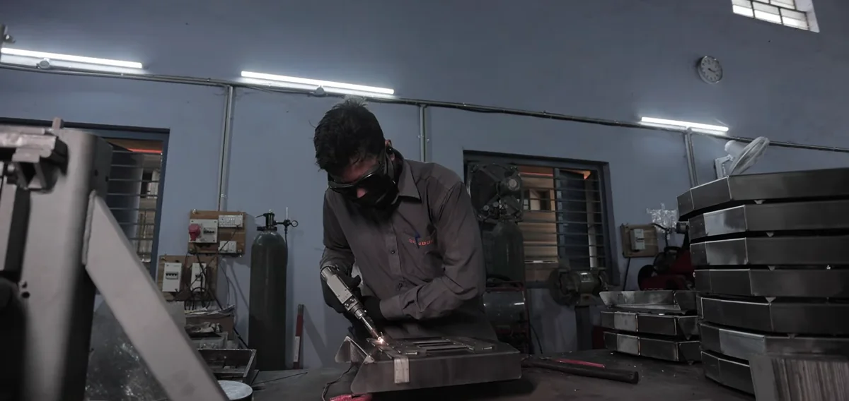 Welding and fabrication of a machine body